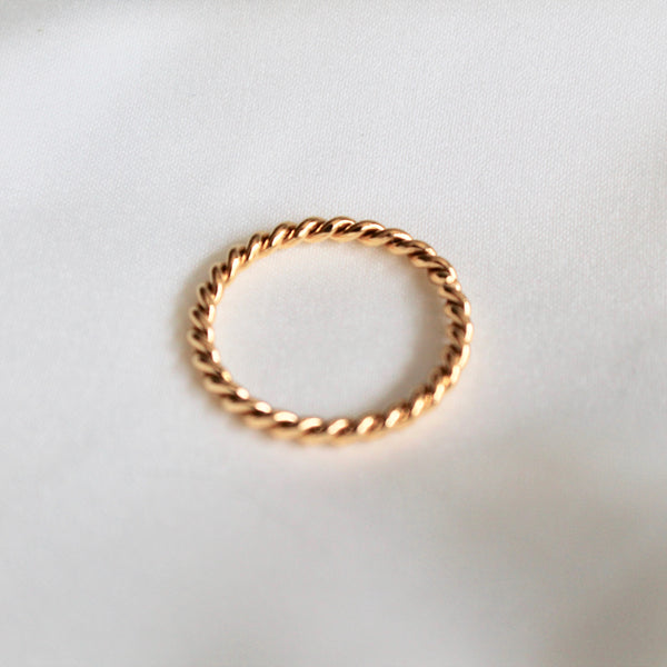 Tiny twisted ring