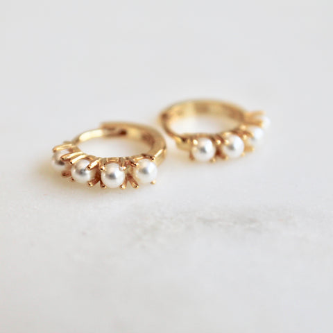 Tiny pearl huggie earrings
