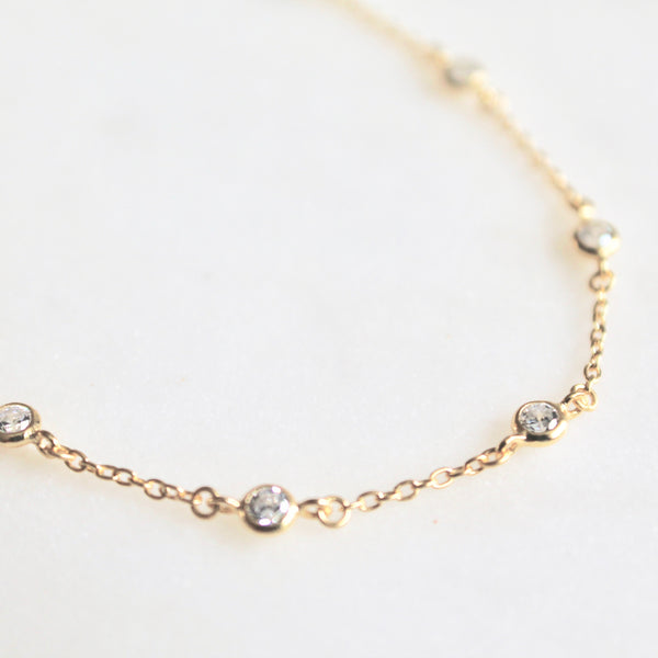 Tiny bezel ankle bracelet