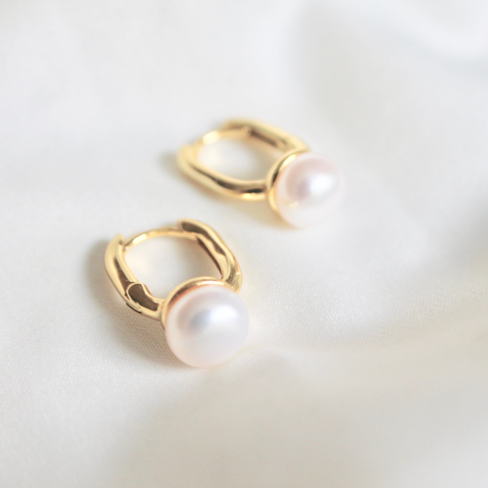 Vivienne pearl huggie earrings