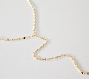 Gold lariat necklace