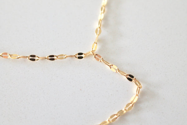 Gold lariat necklace