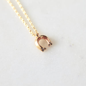 Tiny horseshoe pendant necklace