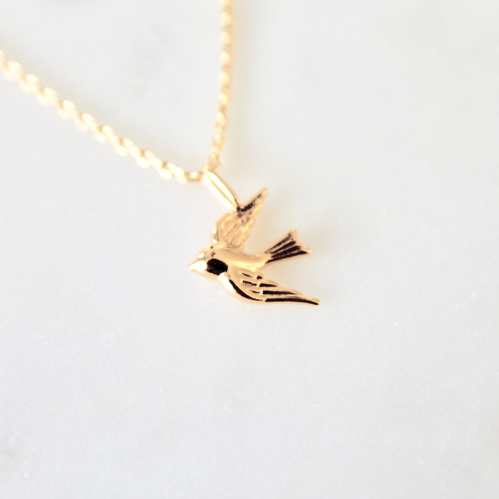 Bird pendant necklace