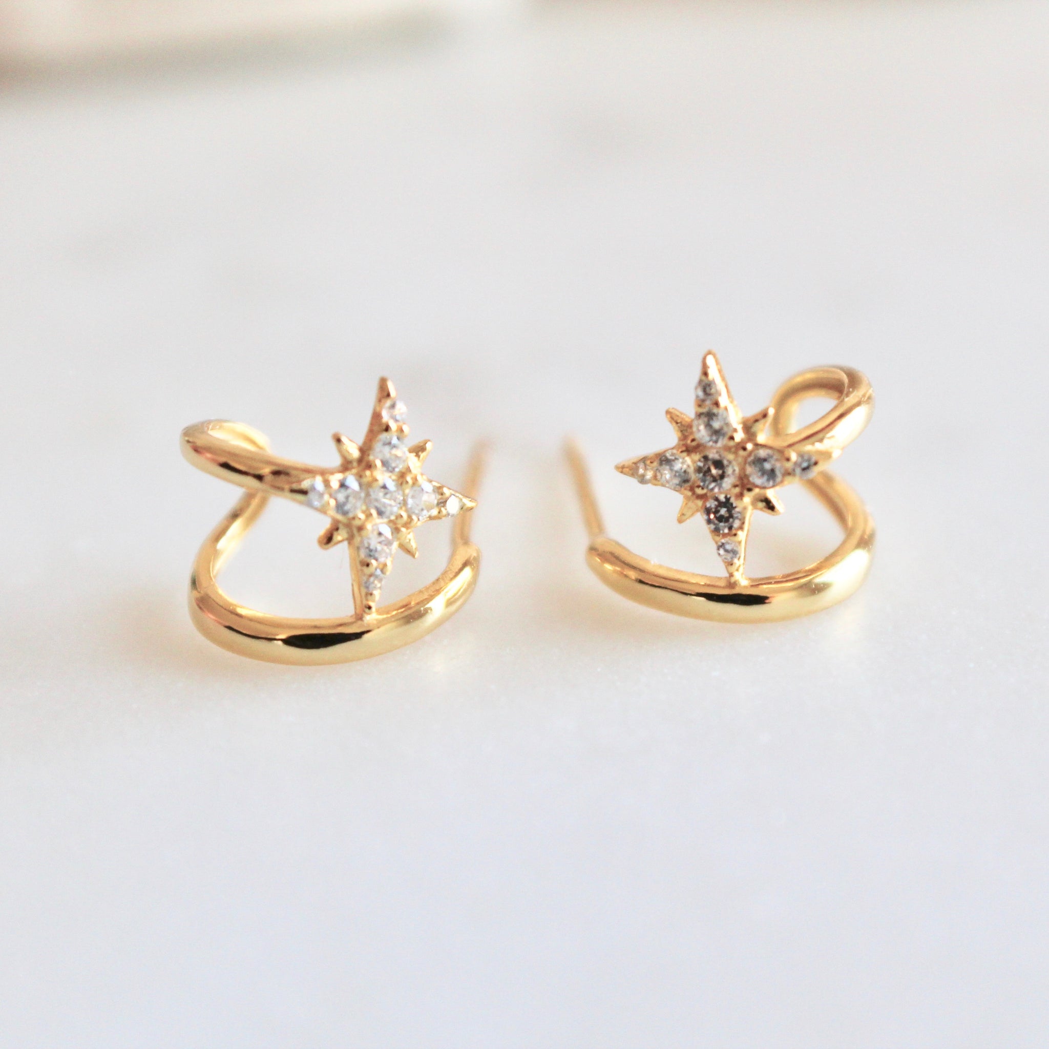 Star huggie earrings