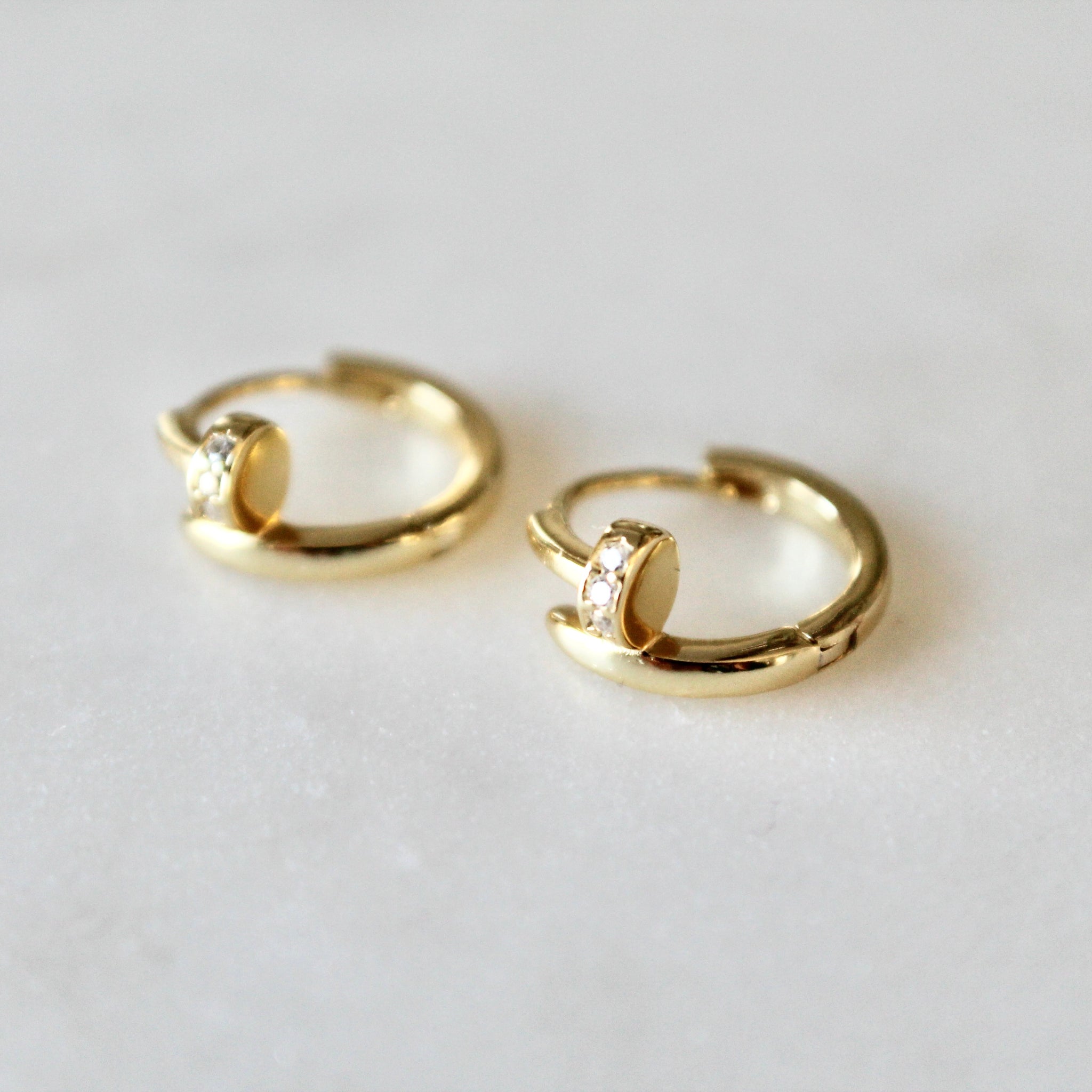 Nail huggie earrings