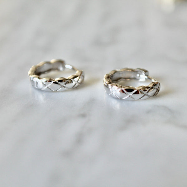 X Cross huggie earrings