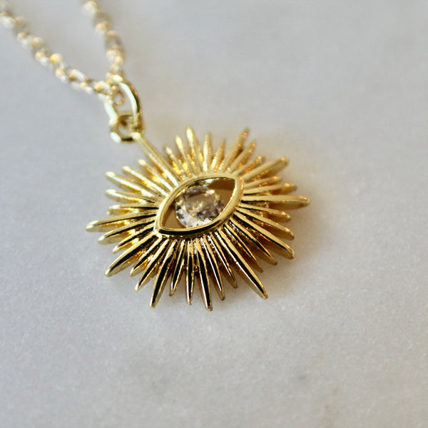 Evil eye sun necklace
