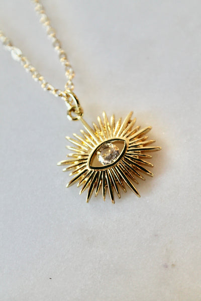 Evil eye sun necklace