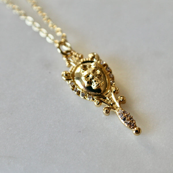 Scull mirror gold necklace