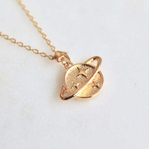 Gold planet necklace