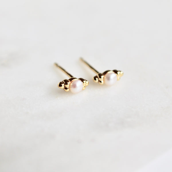 Tiny pearl studs