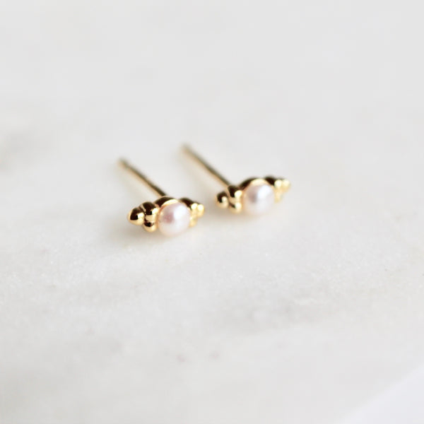 Tiny pearl studs