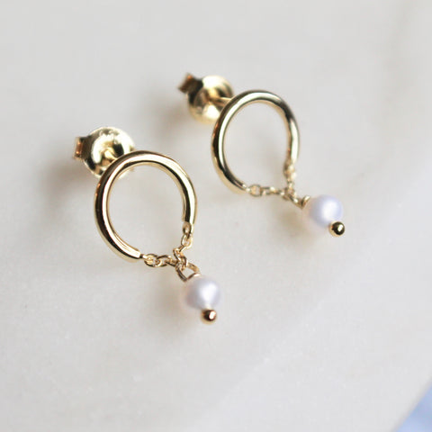 Tiny pearl stud earrings
