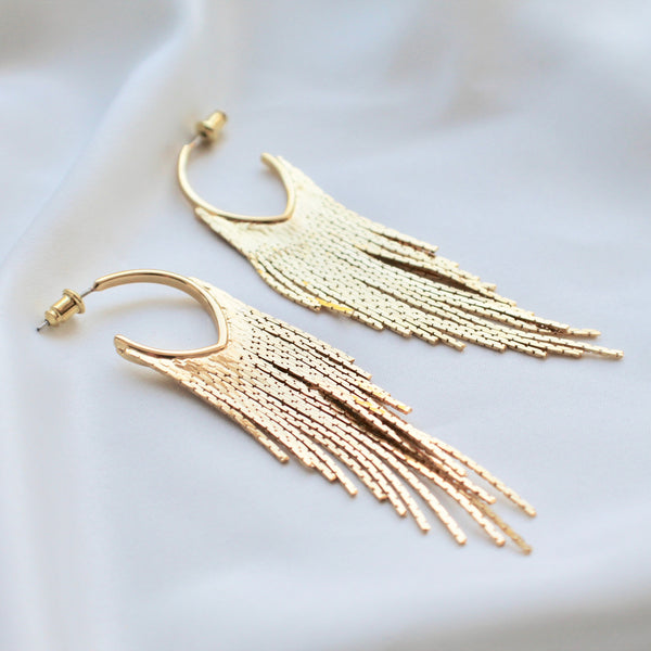 Gold fringe statement earrings