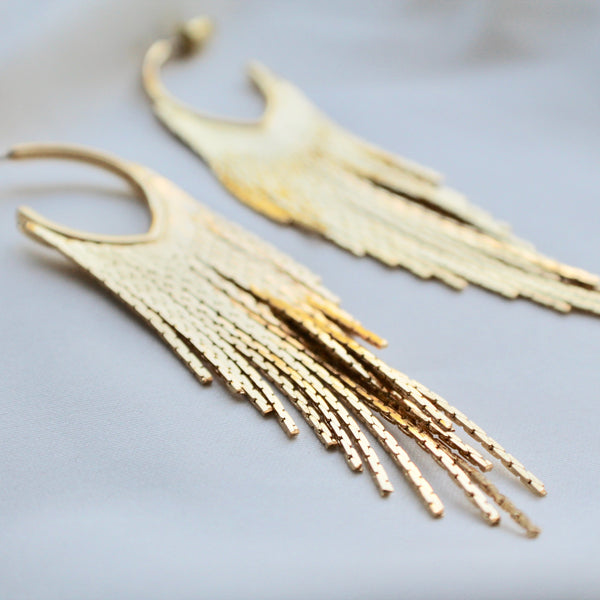 Gold fringe statement earrings