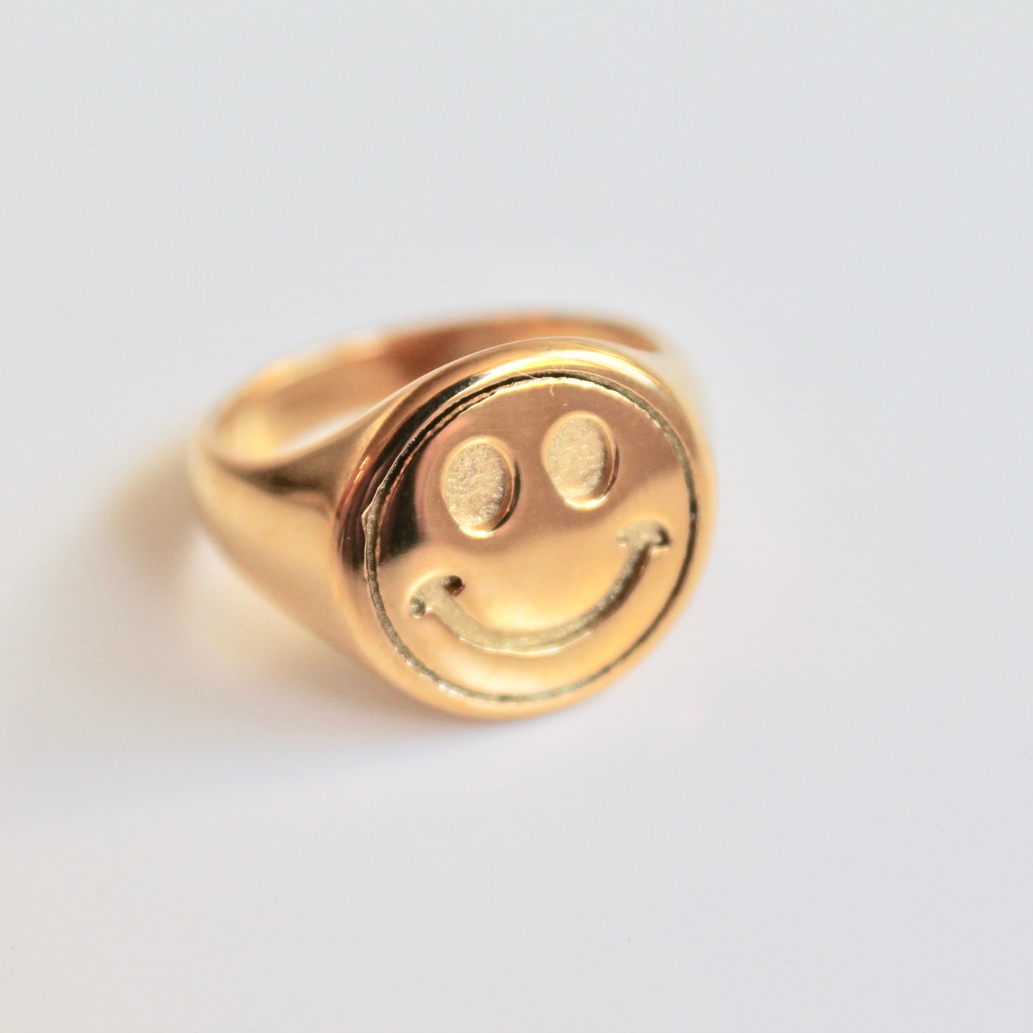 Smiley face signet ring