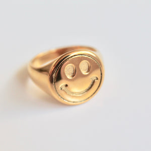 Smiley face signet ring