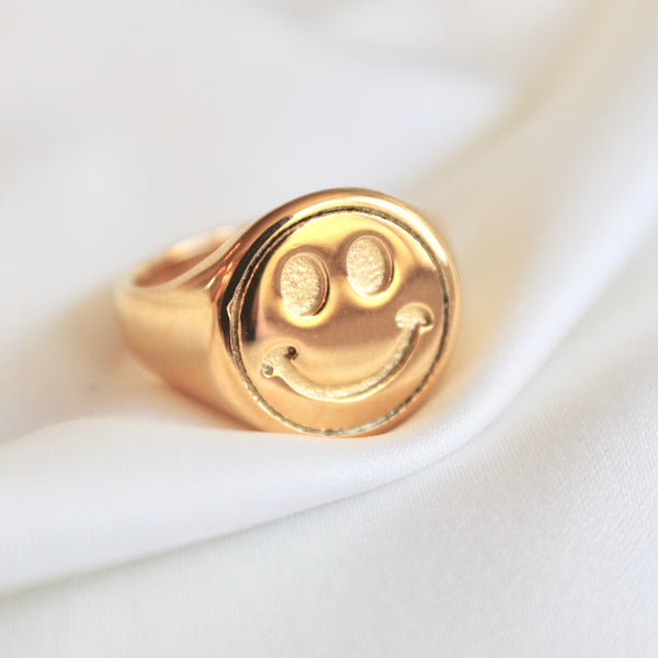 Smiley face signet ring