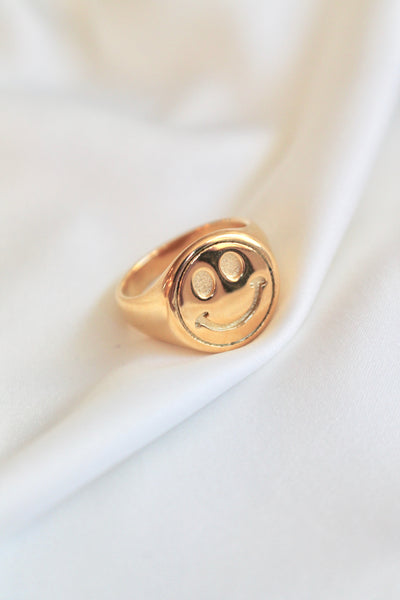 Smiley face signet ring