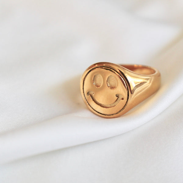 Smiley face signet ring